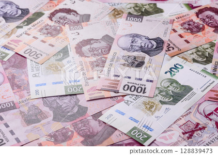 Money, Mexican currency, peso banknotes. Conceptual financial background 128839473