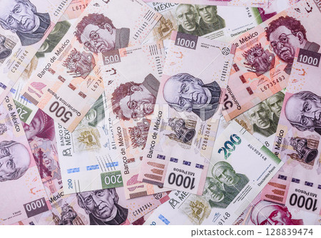 Money, Mexican currency, peso banknotes. Conceptual financial background 128839474