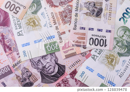 Money, Mexican currency, peso banknotes. Conceptual financial background 128839478