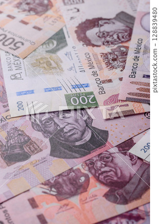 Money, Mexican currency, peso banknotes. Conceptual financial background Money, Mexican currency, peso banknotes. Conceptual financial background 128839480