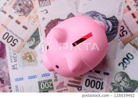 Money, Mexican currency, peso banknotes. Conceptual financial background Money, Mexican currency, peso banknotes. Conceptual financial background 128839482