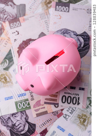 Money, Mexican currency, peso banknotes. Conceptual financial background Money, Mexican currency, peso banknotes. Conceptual financial background 128839483