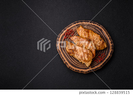Chicken breast, grilled fillet, meat meal on a plate Chicken breast, grilled fillet, meat meal on a plate 128839515