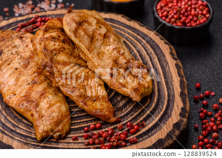 Chicken breast, grilled fillet, meat meal on a plate 128839524