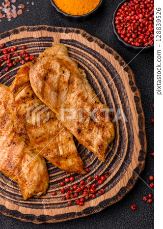 Chicken breast, grilled fillet, meat meal on a plate 128839526