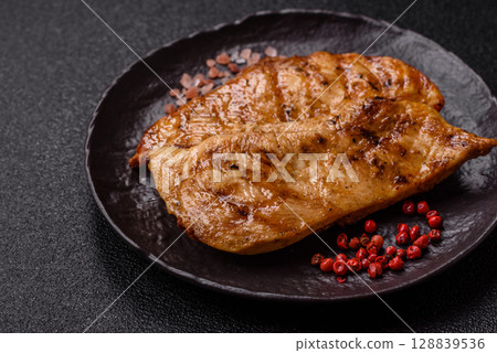 Chicken breast, grilled fillet, meat meal on a plate 128839536