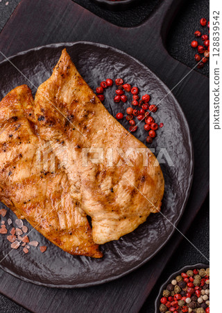 Chicken breast, grilled fillet, meat meal on a plate 128839542