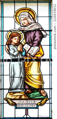 Saint Anne staiined glass window in parish church of the Holy Trinity in Krasic, Croatia Saint Anne staiined glass window in parish church of the Holy Trinity in Krasic, Croatia 128839652