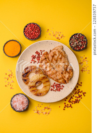 Chicken breast, grilled fillet, meat meal on a plate 128839757