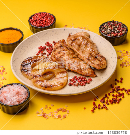 Chicken breast, grilled fillet, meat meal on a plate 128839758