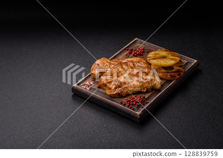 Chicken breast, grilled fillet, meat meal on a plate 128839759