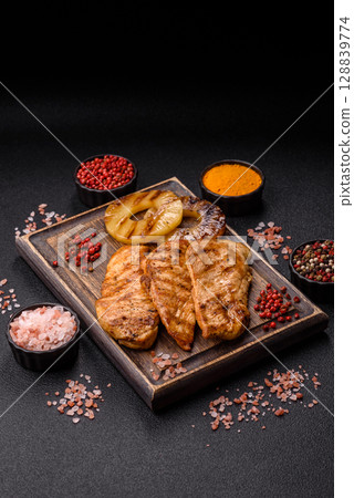 Chicken breast, grilled fillet, meat meal on a plate 128839774