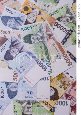 Paper money, South Korean banknotes as a financial business background Paper money, South Korean banknotes as a financial business background 128839789