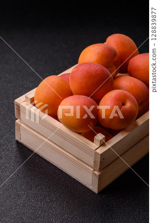 Fresh ripe fruit apricots are red yellow in color Fresh ripe fruit apricots are red yellow in color 128839877
