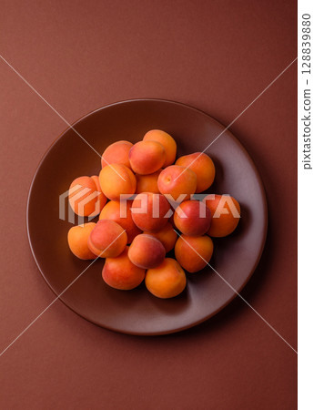 Fresh ripe fruit apricots are red yellow in color Fresh ripe fruit apricots are red yellow in color 128839880