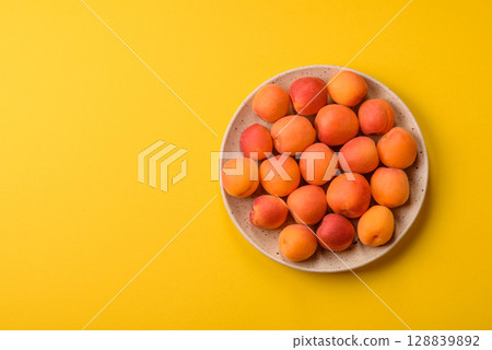 Fresh ripe fruit apricots are red yellow in color Fresh ripe fruit apricots are red yellow in color 128839892