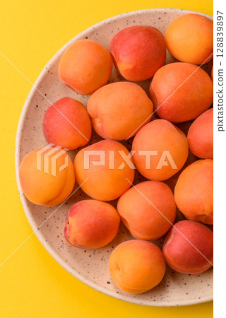 Fresh ripe fruit apricots are red yellow in color Fresh ripe fruit apricots are red yellow in color 128839897