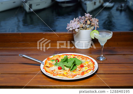 assorted pizza with different fillings: salami, tomatoes, mushrooms, bacon, sun-dried tomatoes. assorted pizza with different fillings: salami, tomatoes, mushrooms, bacon, sun-dried tomatoes. 128840195