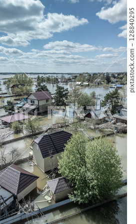 Floods and cyclone, global warming. Climate change,natural disasters the tsunami of nature.The apocalypse, catastrophes.Storms and destruction.The remnants of human life are floating in dirty water 128840295