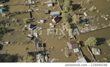 Floods and cyclone, global warming. Climate change,natural disasters the tsunami of nature.The apocalypse, catastrophes.Storms and destruction.The remnants of human life are floating in dirty water 128840296