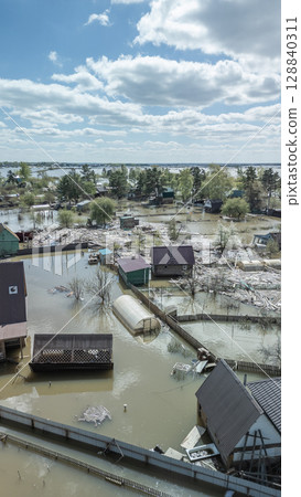 Floods and cyclone, global warming. Climate change,natural disasters the tsunami of nature.The apocalypse, catastrophes.Storms and destruction.The remnants of human life are floating in dirty water 128840311