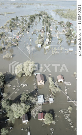 Floods and cyclone, global warming. Climate change,natural disasters the tsunami of nature.The apocalypse, catastrophes.Storms and destruction.The remnants of human life are floating in dirty water 128840321