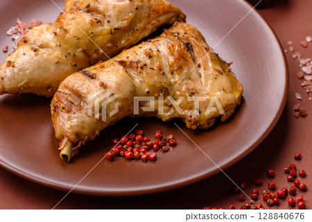 Grilled chicken leg or quarter. Barbecued meat with salt and spices Grilled chicken leg or quarter. Barbecued meat with salt and spices 128840676