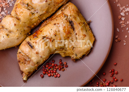 Grilled chicken leg or quarter. Barbecued meat with salt and spices Grilled chicken leg or quarter. Barbecued meat with salt and spices 128840677