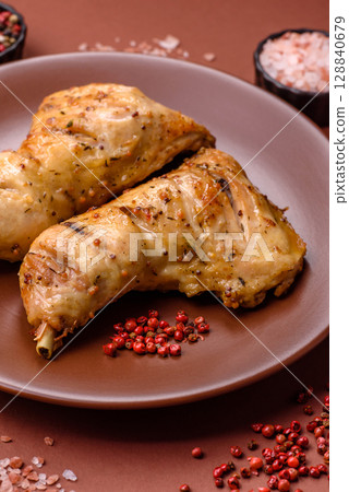 Grilled chicken leg or quarter. Barbecued meat with salt and spices 128840679