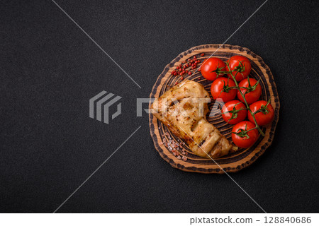 Grilled chicken leg or quarter. Barbecued meat with salt and spices Grilled chicken leg or quarter. Barbecued meat with salt and spices 128840686