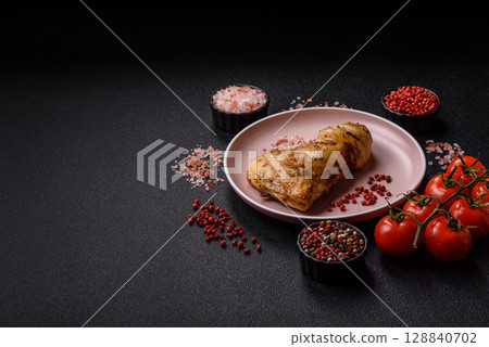 Grilled chicken leg or quarter. Barbecued meat with salt and spices 128840702