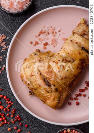 Grilled chicken leg or quarter. Barbecued meat with salt and spices 128840708