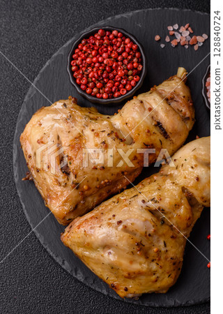 Grilled chicken leg or quarter. Barbecued meat with salt and spices 128840724