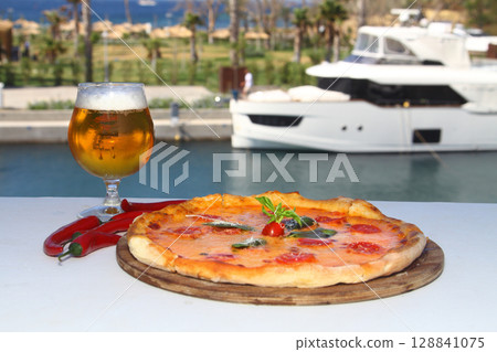 assorted pizza with different fillings: salami, tomatoes, mushrooms, bacon, sun-dried tomatoes assorted pizza with different fillings: salami, tomatoes, mushrooms, bacon, sun-dried tomatoes 128841075
