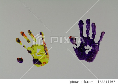 colorful hand print on the wall colorful hand print on the wall 128841167