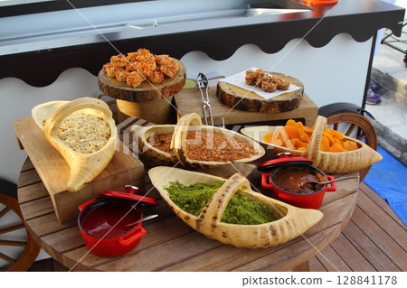 small appetizer dishes prepared for cocktail and local food small appetizer dishes prepared for cocktail and local food 128841178