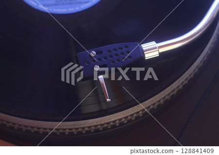 old vinyl record with clipping path. Close up at the needle on turntable old vinyl record with clipping path. Close up at the needle on turntable 128841409
