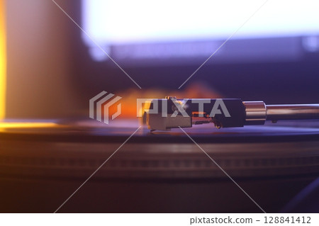 old vinyl record with clipping path. Close up at the needle on turntable old vinyl record with clipping path. Close up at the needle on turntable 128841412