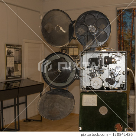 Shot of the vintage, old, obsolete movie film projector 128841426