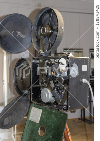 Shot of the vintage, old, obsolete movie film projector 128841429
