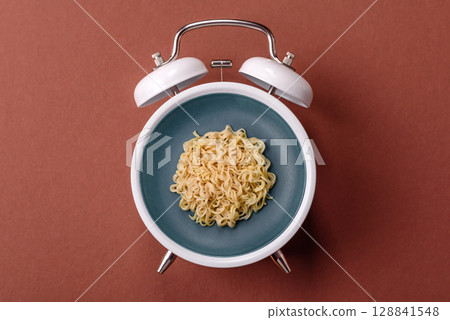 Italian pasta with meat, sauce and vegetables. Conceptual background time to eat pasta Italian pasta with meat, sauce and vegetables. Conceptual background time to eat pasta 128841548