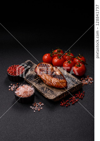 Chicken breast, grilled fillet, meat meal on a plate. Grilled poultry for dinner 128841737