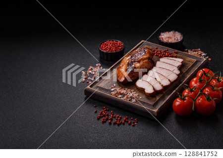 Chicken breast, grilled fillet, meat meal on a plate. Grilled poultry for dinner Chicken breast, grilled fillet, meat meal on a plate. Grilled poultry for dinner 128841752