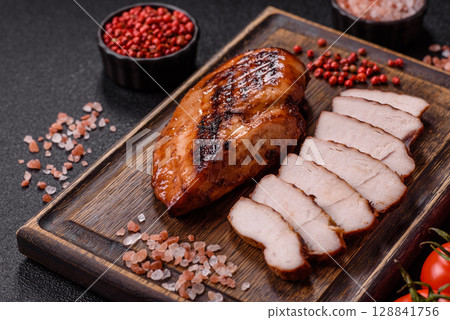 Chicken breast, grilled fillet, meat meal on a plate. Grilled poultry for dinner 128841756