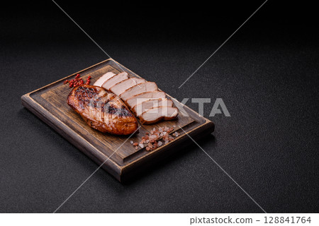 Chicken breast, grilled fillet, meat meal on a plate. Grilled poultry for dinner 128841764