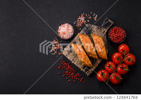 Roll of omelette, spinach, cheese and minced meat Roll of omelette, spinach, cheese and minced meat 128841768