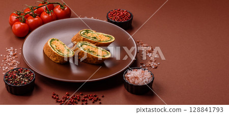 Roll of omelette, spinach, cheese and minced meat Roll of omelette, spinach, cheese and minced meat 128841793