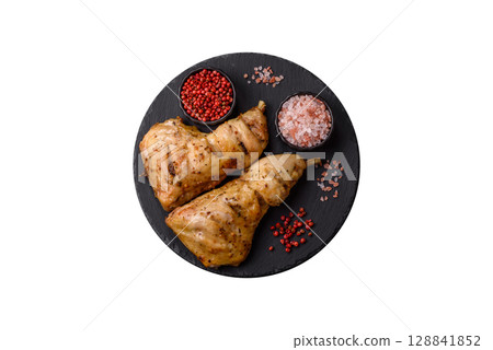 Grilled chicken leg or quarter. Barbecued meat with salt and spices 128841852