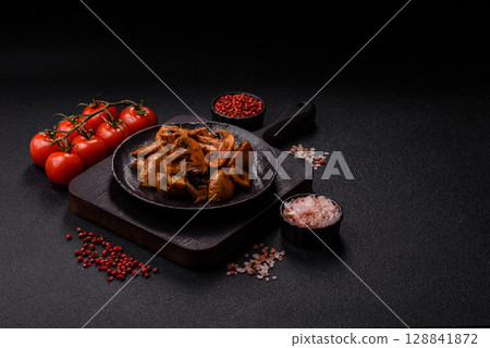 Food, baked mushrooms champignon slices with sauce and spices Food, baked mushrooms champignon slices with sauce and spices 128841872