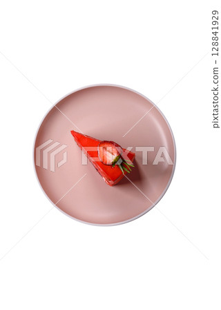 A piece of red velvet cake as a food background. Sweet pastries for celebration A piece of red velvet cake as a food background. Sweet pastries for celebration 128841929